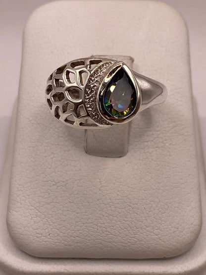 Anillo Moderno con Zirconia Iridiscente en Forma de Gota en Plata Ley 950, vista superior