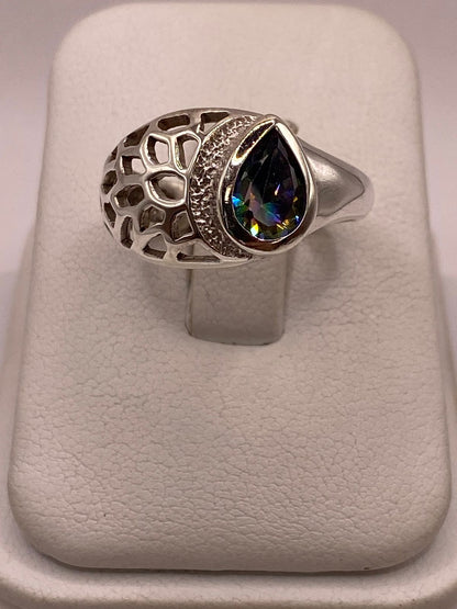 Anillo Moderno con Zirconia Iridiscente en Forma de Gota en Plata Ley 950, vista posterior