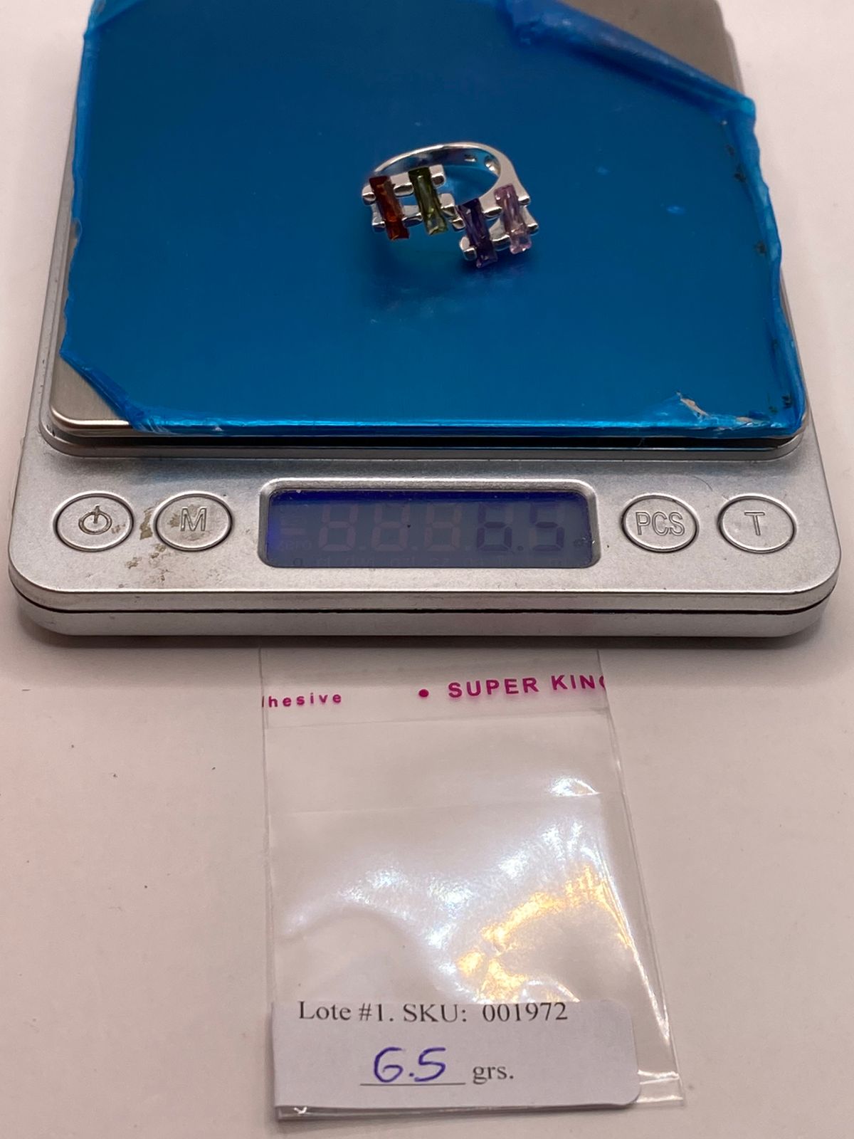 Anillo Multicolor de Zirconias Baguette Plata Ley 925, peso en gramos (báscula)
