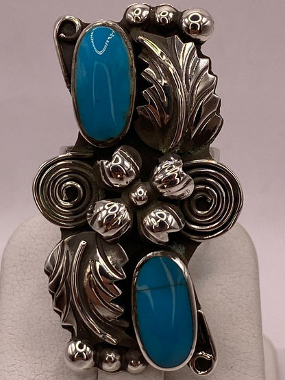 Anillo Navajo de Pluma de Plata Ley 925 con Turquesa, sello de autenticidad Plata Ley .925