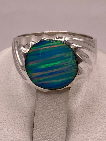 Anillo con Ópalo de Fuego Azul Celeste Iridiscente en Plata Ley .950, sello de autenticidad Plata Ley .925