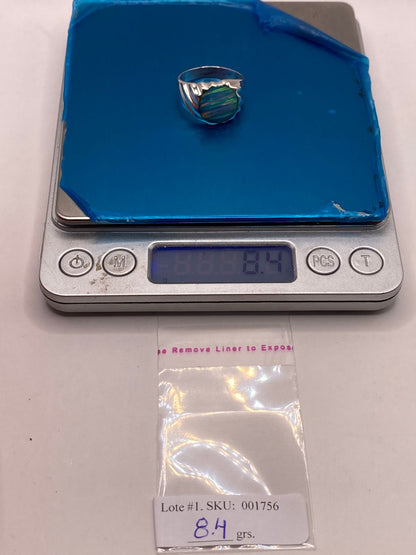 Anillo con Ópalo de Fuego Azul Celeste Iridiscente en Plata Ley .950, peso en gramos (báscula)