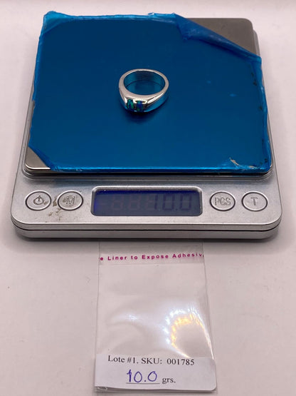 Anillo con Ópalo de Fuego Azul con Destellos Verdes Iridiscentes en Plata Ley .925, peso en gramos (báscula)