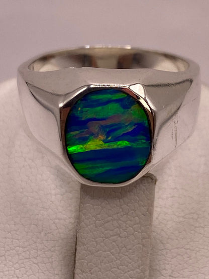 Anillo de Ópalo de Fuego Azul Iridiscente en Plata Ley .925, sello de autenticidad Plata Ley .925