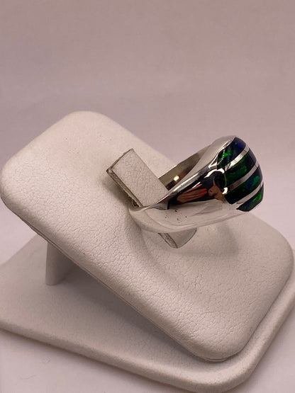 Anillo con Ópalo de Fuego Azul en Plata Ley .950, vista lateral