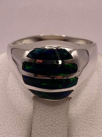 Anillo con Ópalo de Fuego Azul en Plata Ley .950, sello de autenticidad Plata Ley .925