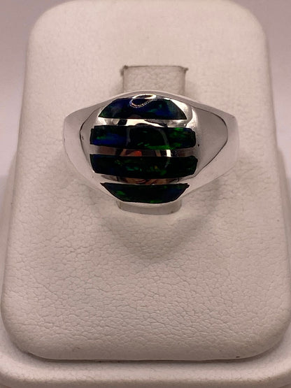 Anillo con Ópalo de Fuego Azul en Plata Ley .950, vista de detalle