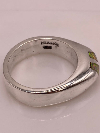 Anillo con Ópalo de Fuego Iridiscente en Plata Ley .925, sello de autenticidad Plata Ley .925