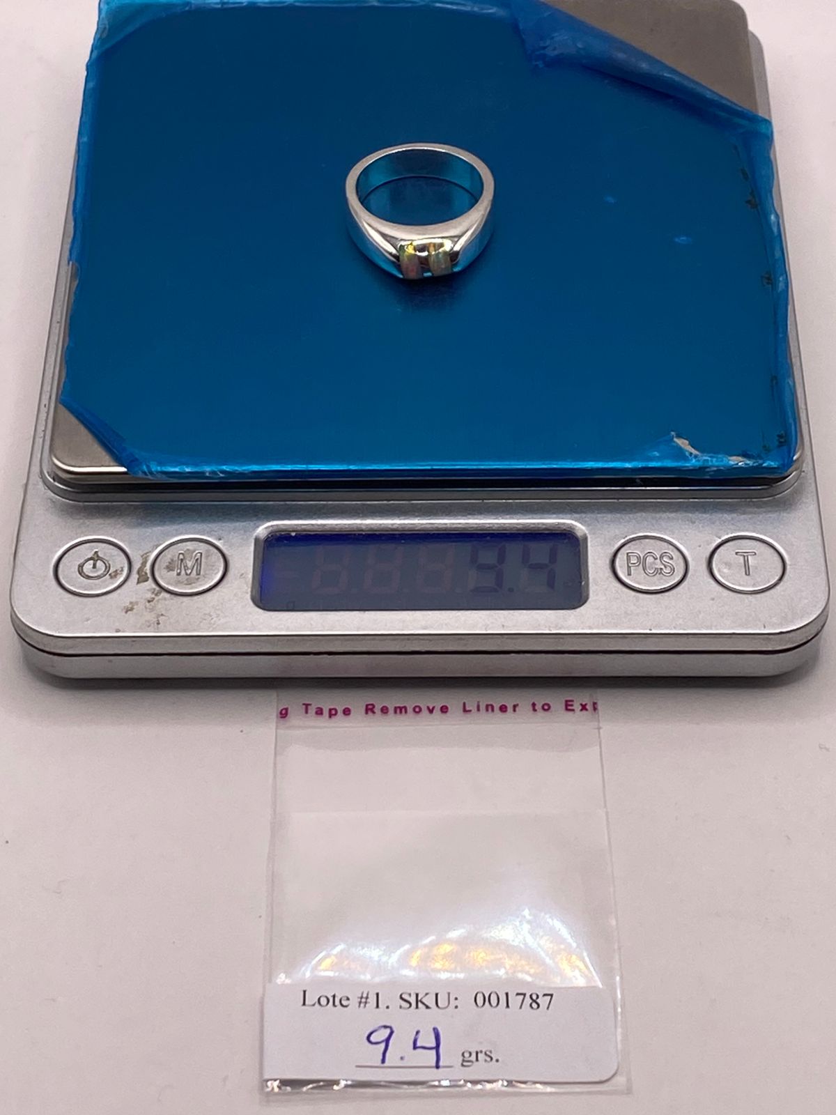 Anillo con Ópalo de Fuego Iridiscente en Plata Ley .925, peso en gramos (báscula)