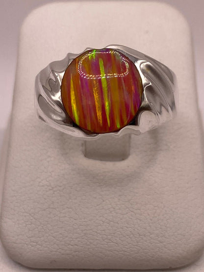 Anillo con Ópalo de Fuego Rosa con Destellos Amarillos en Plata Ley .950, vista de detalle