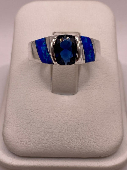 Anillo con Ópalo de Fuego y Zirconia Azul en Plata Ley .950, vista de detalle
