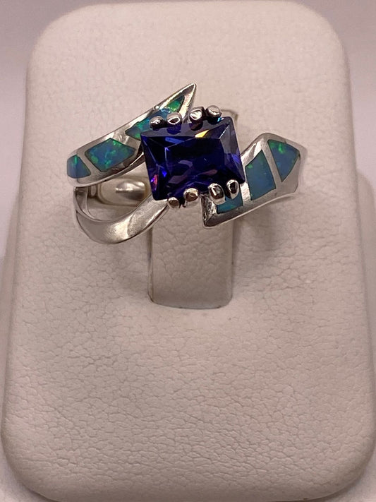 Anillo de Ópalo de Fuego y Zirconia Azul en Plata Ley .950, vista frontal