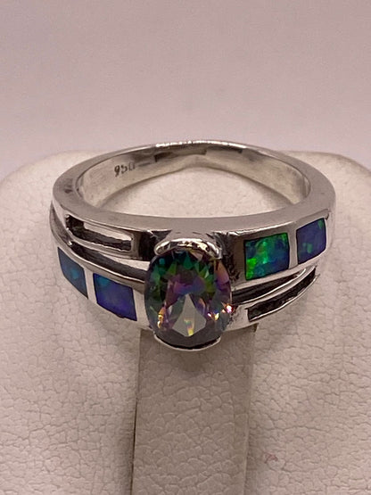 Anillo con Ópalo de Fuego y Zirconia Multicolor en Plata Ley .950, sello de autenticidad Plata Ley .925