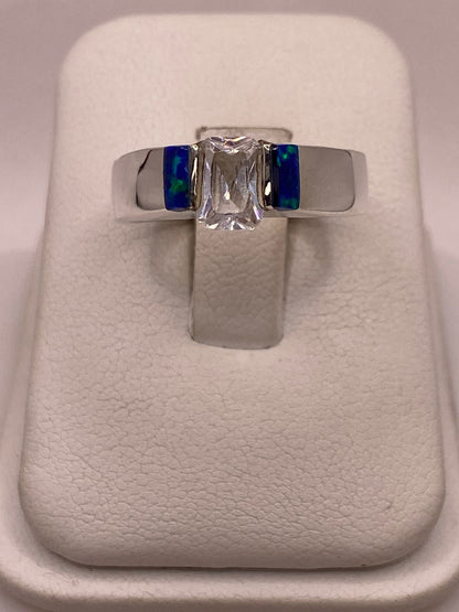 Anillo con Ópalo de Fuego y Zirconia en Plata Ley .925 — vista lateral