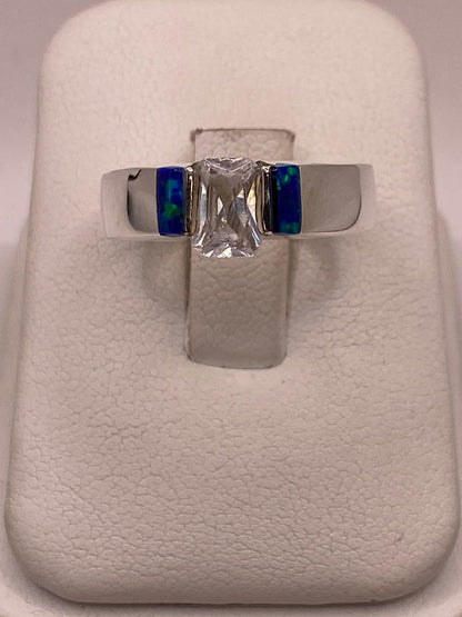 Anillo con Ópalo de Fuego y Zirconia en Plata Ley .925, vista lateral
