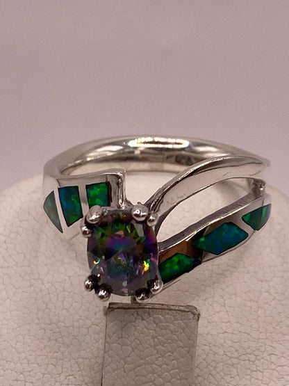 Anillo con Ópalo de Fuego y Zirconia Tornasol en Plata Ley .950, sello de autenticidad Plata Ley .925