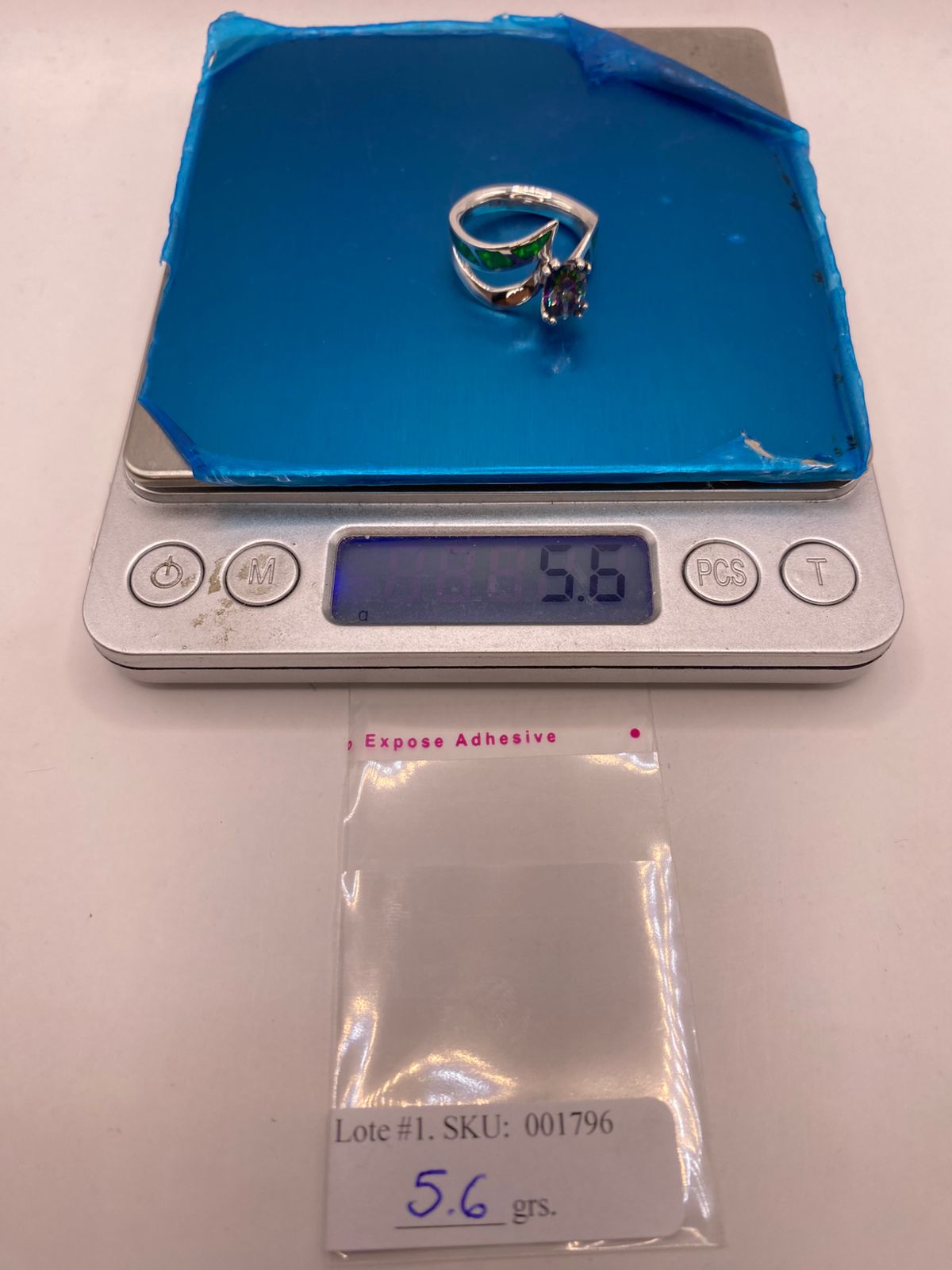 Anillo con Ópalo de Fuego y Zirconia Tornasol en Plata Ley .950, peso en gramos (báscula)