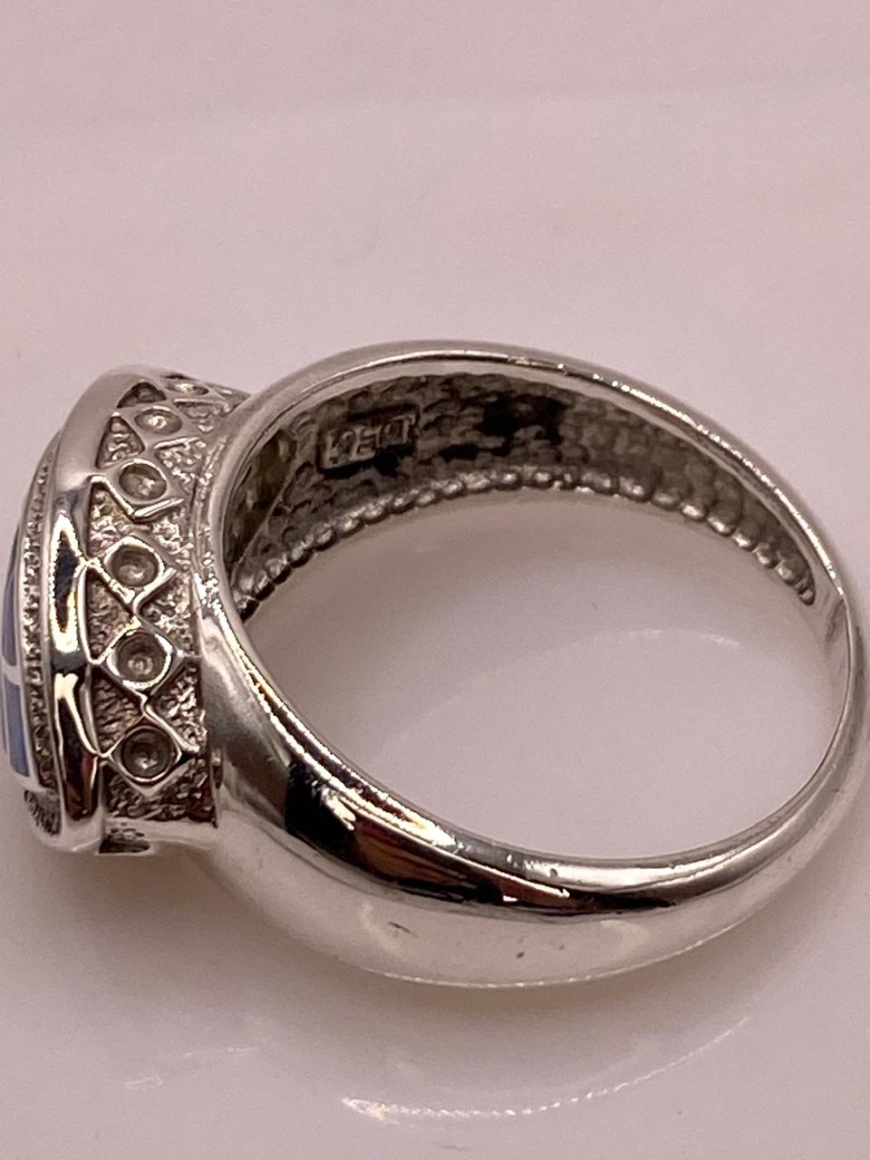 Anillo Ovalado con Ópalo de Fuego en Plata Ley .950, sello de autenticidad Plata Ley .925