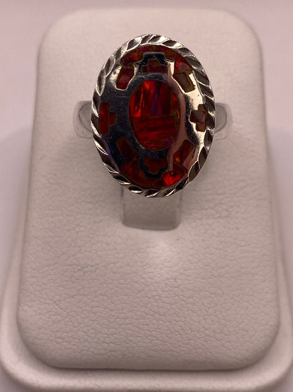 Anillo Ovalado de Plata Ley 950 con Ópalo de Fuego Rojo en báscula mostrando peso