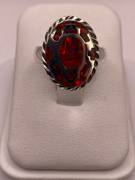 Anillo Ovalado de Plata Ley 950 con Ópalo de Fuego Rojo en báscula mostrando peso