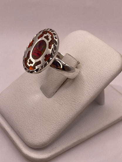 Anillo Ovalado de Plata Ley 950 con Ópalo de Fuego Rojo, vista lateral