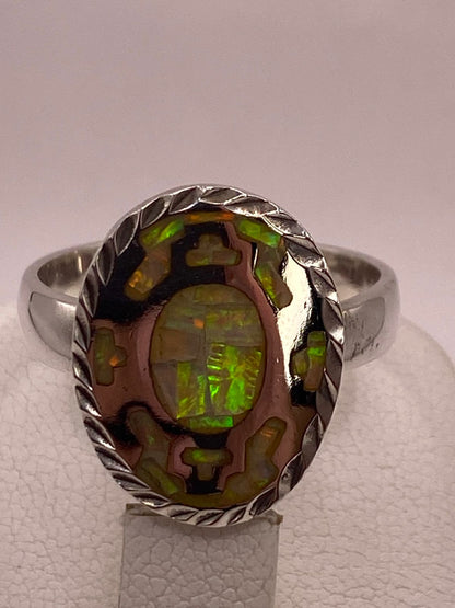 Anillo Ovalado de Plata Ley 950 con Ópalo de Fuego Verde, sello de autenticidad Plata Ley .925