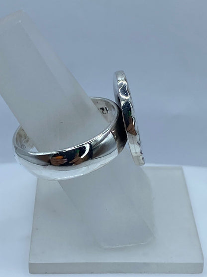 Anillo Ovalado de Plata .950 con Ópalo de Fuego Tornasol, sello de autenticidad Plata Ley .925