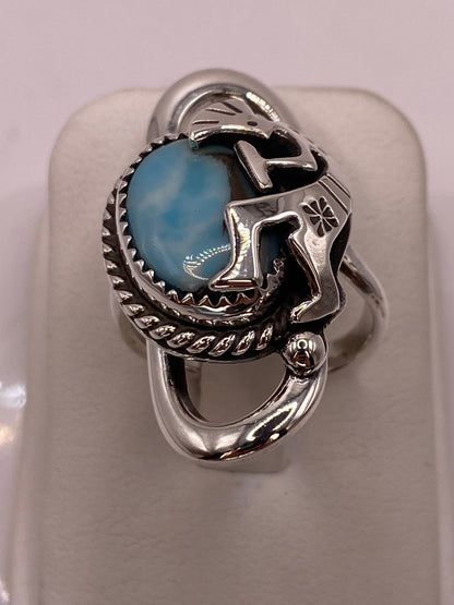 Anillo de Plata Ley 925 con Ágata Azul y Figura Kokopelli, sello de autenticidad Plata Ley .925