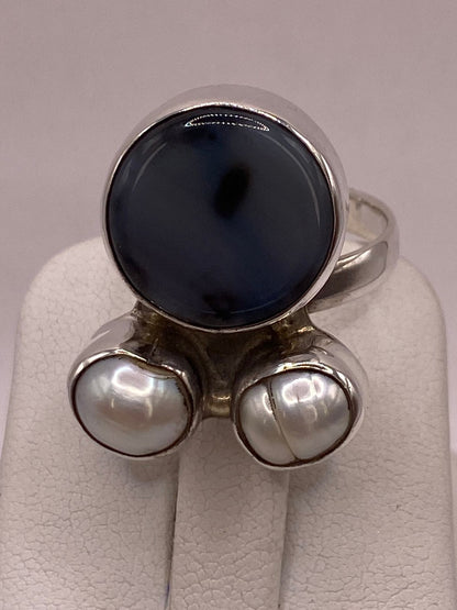 Anillo de Plata Ley 925 con Ágata Azul y Nácar, sello de autenticidad Plata Ley .925