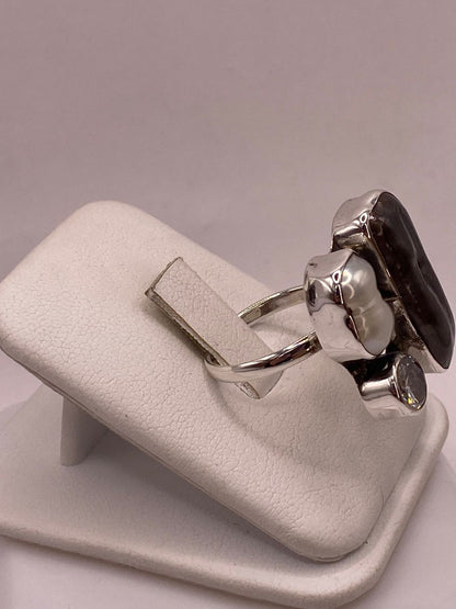Anillo de Plata Ley 925 con Ágata Café, Nácar y Zirconia, vista lateral