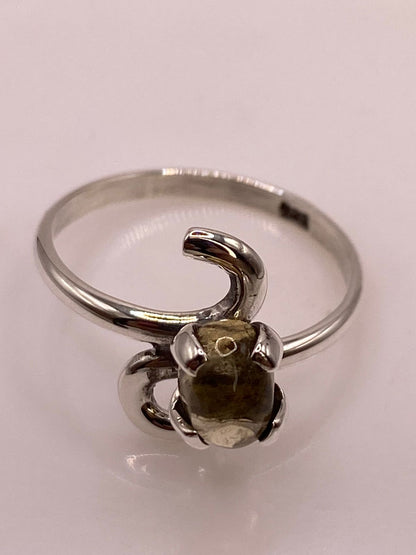 Anillo de Plata Ley 925 con Ámbar Ahumado, sello de autenticidad Plata Ley .925