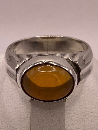Anillo de Plata Ley 925 con Ámbar Miel, sello de autenticidad Plata Ley .925