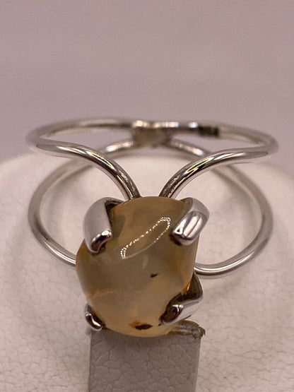 Anillo de Plata Ley 925 con Ámbar Natural, sello de autenticidad Plata Ley .925