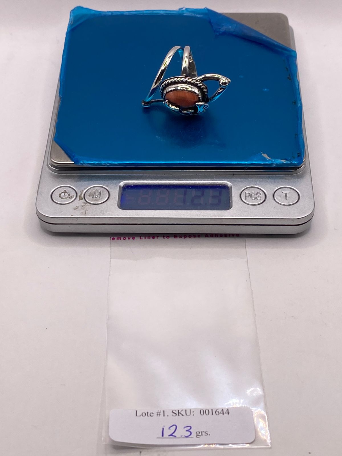 Anillo de Plata Ley 925 con Cornalina y Figura Kokopelli, peso en gramos (báscula)