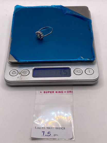 Anillo de Plata Ley 925 Diseño Corazón con Zirconias Violetas, peso en gramos (báscula)