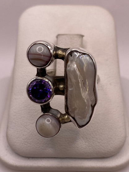 Anillo de Plata Ley 925 con Nácar, Ágata y Zirconia — ángulo diagonal