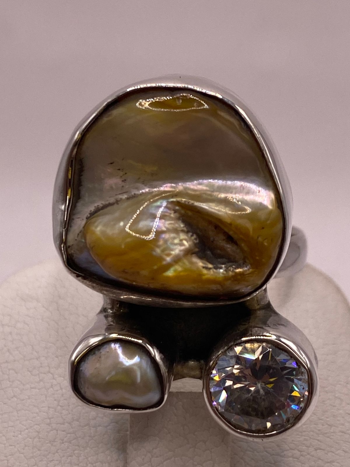 Anillo de Plata Ley 925 con Nácar y Zirconia, sello de autenticidad Plata Ley .925