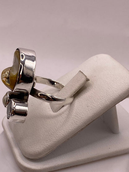 Anillo de Plata Ley 925 con Nácar y Zirconia, vista frontal