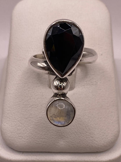 Anillo de Plata Ley 925 con Obsidiana y Piedra Luna en báscula mostrando peso