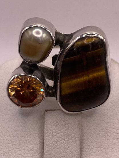 Anillo de Plata Ley 925 con Ojo de Tigre, Nácar y Zirconia, sello de autenticidad Plata Ley .925