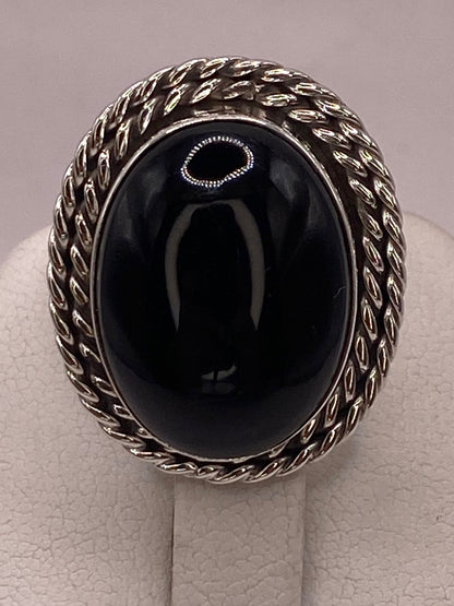 Anillo de Plata Ley 925 con Ónix Negro, sello de autenticidad Plata Ley .925