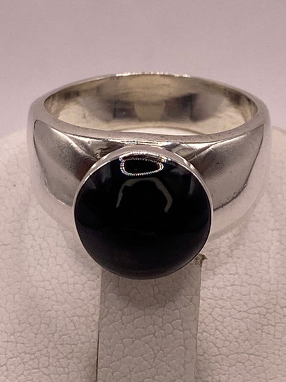 Anillo de Plata Ley 925 con Ónix Negro, sello de autenticidad Plata Ley .925