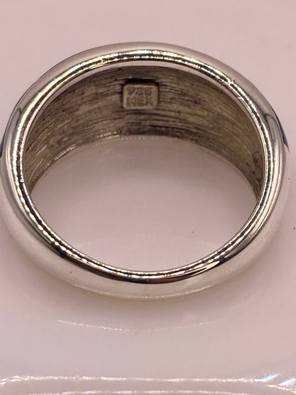 Anillo de Plata Ley 925 con Ópalo Azul y Verde Diseño Envolvente, sello de autenticidad Plata Ley .925