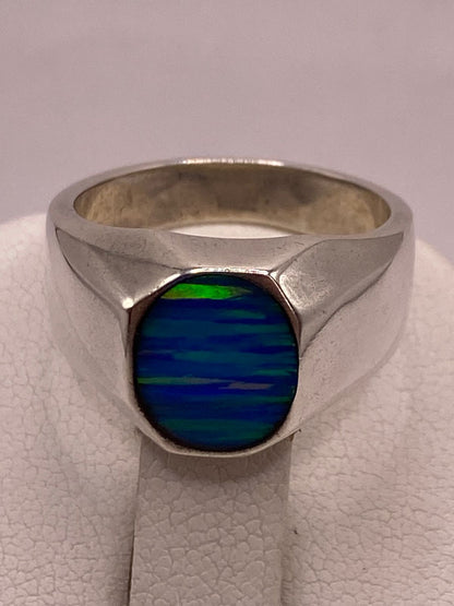 Anillo de Plata Ley 925 con Ópalo de Fuego Azul, sello de autenticidad Plata Ley .925