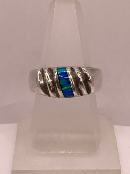 Anillo de Plata Ley 925 con Ópalo de Fuego Azul — vista lateral