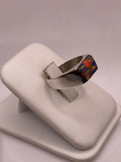 Anillo de Plata Ley 925 con Ópalo de Fuego Azul, vista lateral