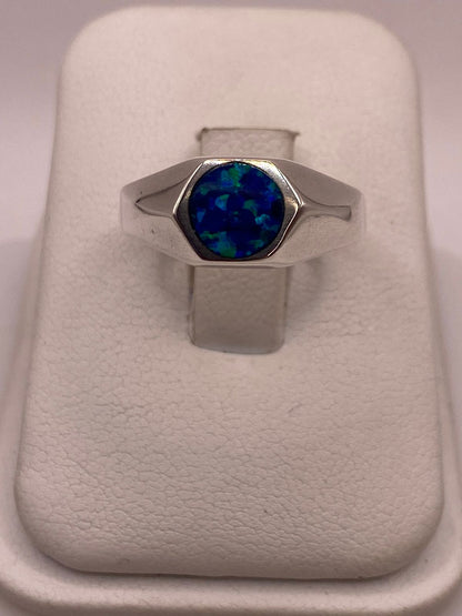 Anillo de Plata Ley 925 con Ópalo de Fuego Azul en báscula mostrando peso