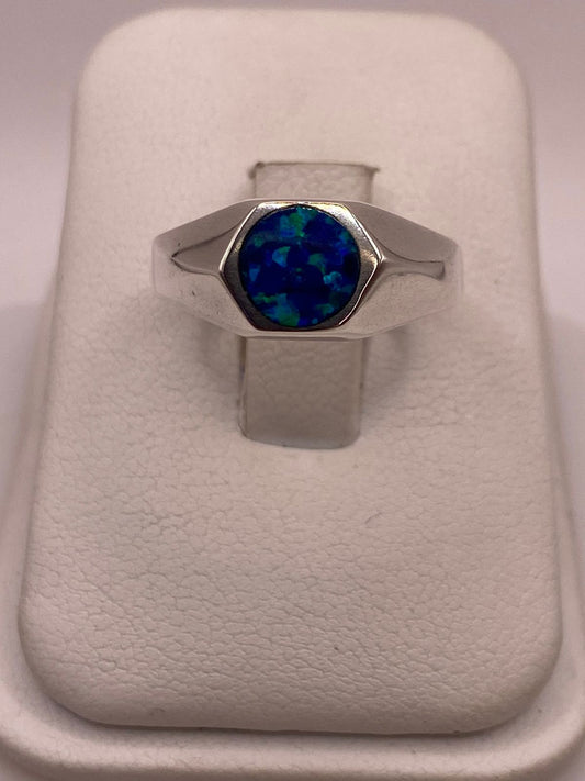 Anillo de Plata Ley 925 con Ópalo de Fuego Azul en báscula mostrando peso