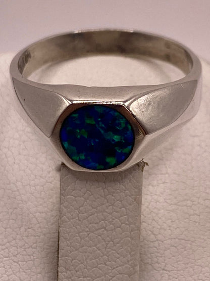 Anillo de Plata Ley 925 con Ópalo de Fuego Azul, sello de autenticidad Plata Ley .925