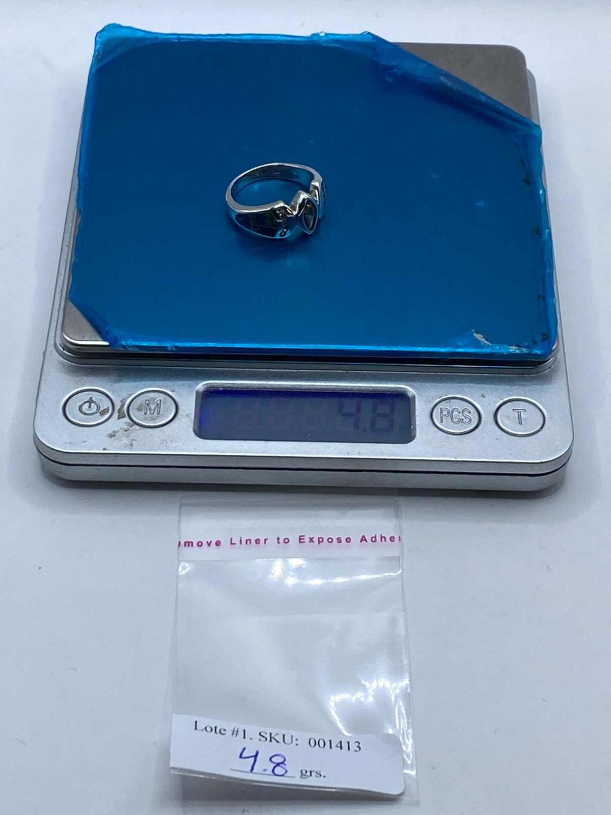 Anillo de Plata Ley 925 con Ópalo de Fuego Azul y Zirconia Verde Olivo, peso en gramos (báscula)